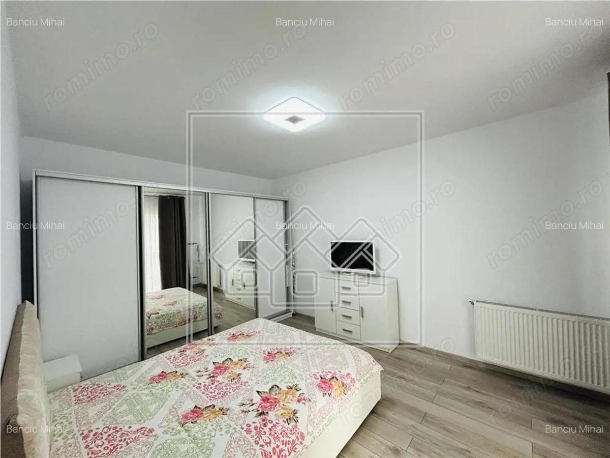 Ap spatios, cu 3 camere, 2 balcoane, etaj 1 3, loc de parcare-Selimbar - 12