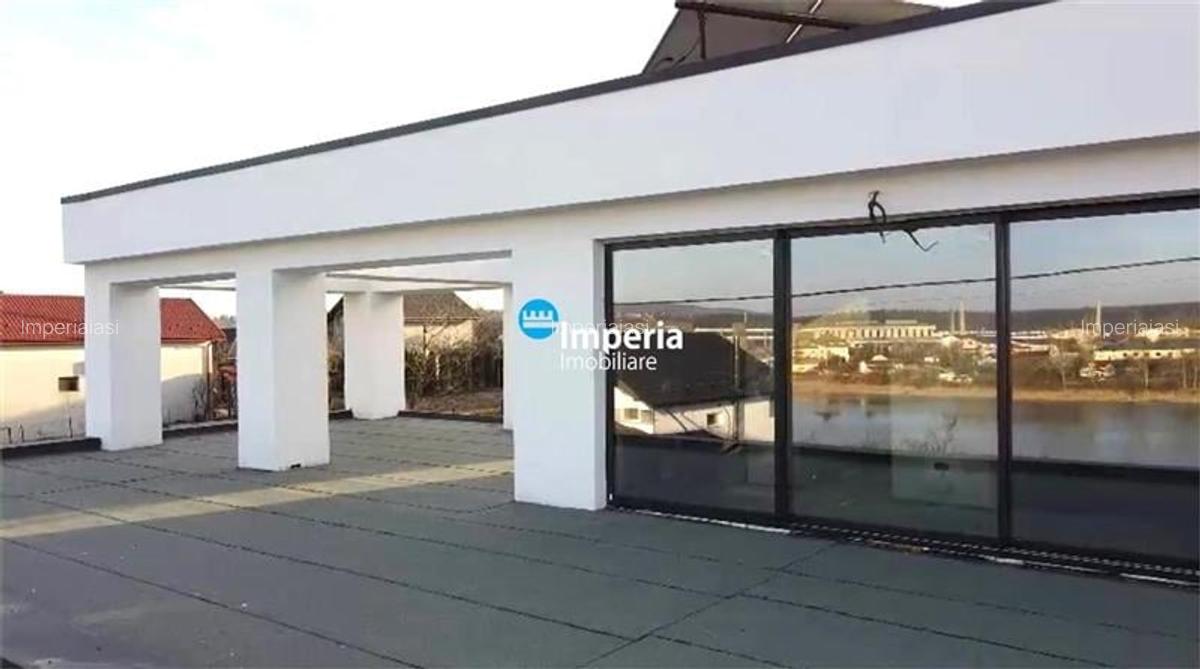 Casa eficienta energetic, cu sistem trifazat EV si tehnologii de top  Vedere la - 2