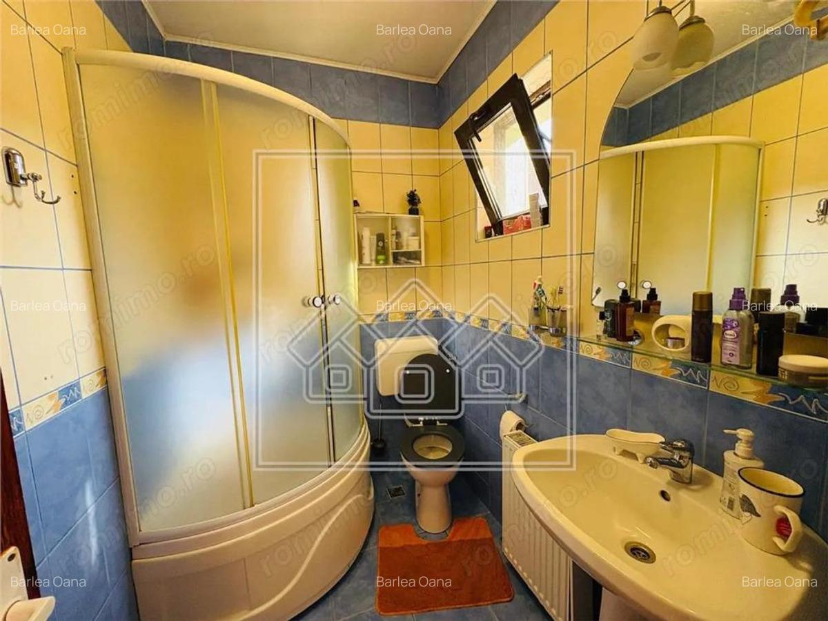 Casa individuala - teren 250 mp - pivnita si garaj - Selimbar - 11