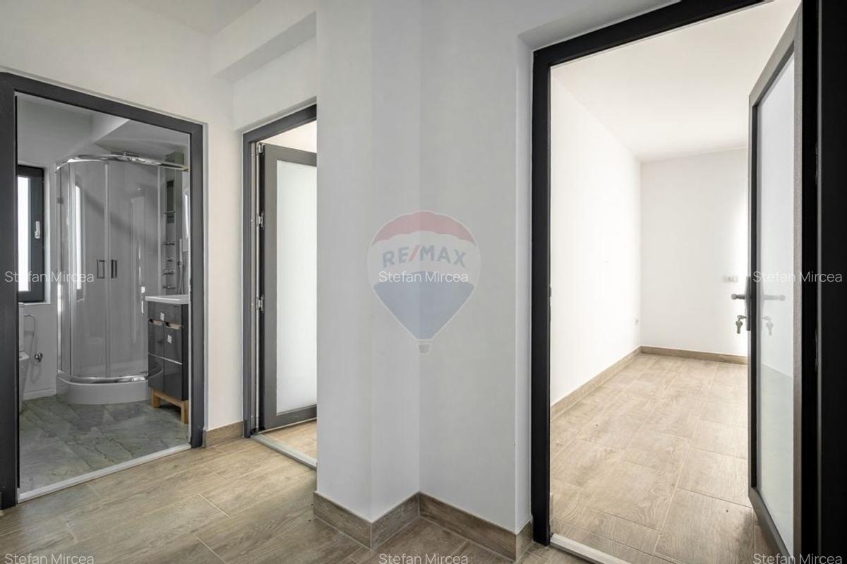 Casa noua in Stupini: 4 camere, 3 bai si teren generos de 600 mp - 24