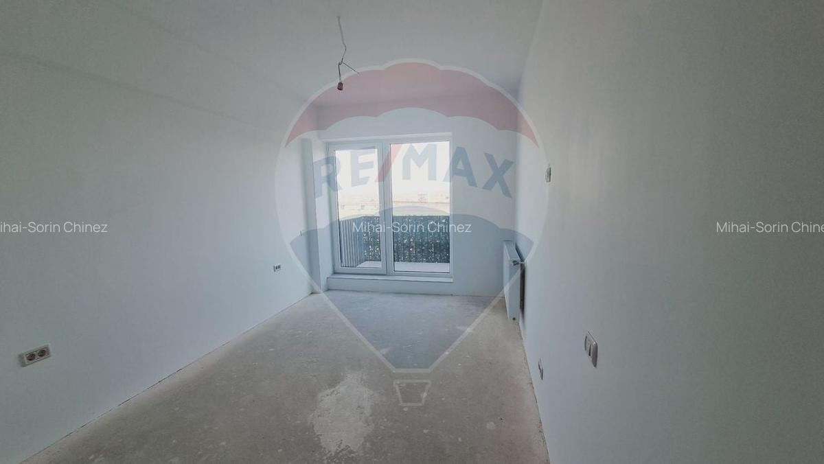 Apartament de vanzare - 3 camere, 72,37 mp + balcon generos - 10
