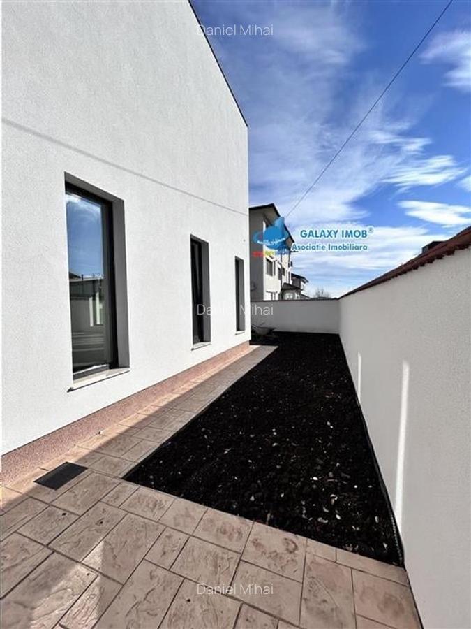 Casa individula exclusivista 4 cam--Terasa-Curte amenajata-Comision 0% - 32