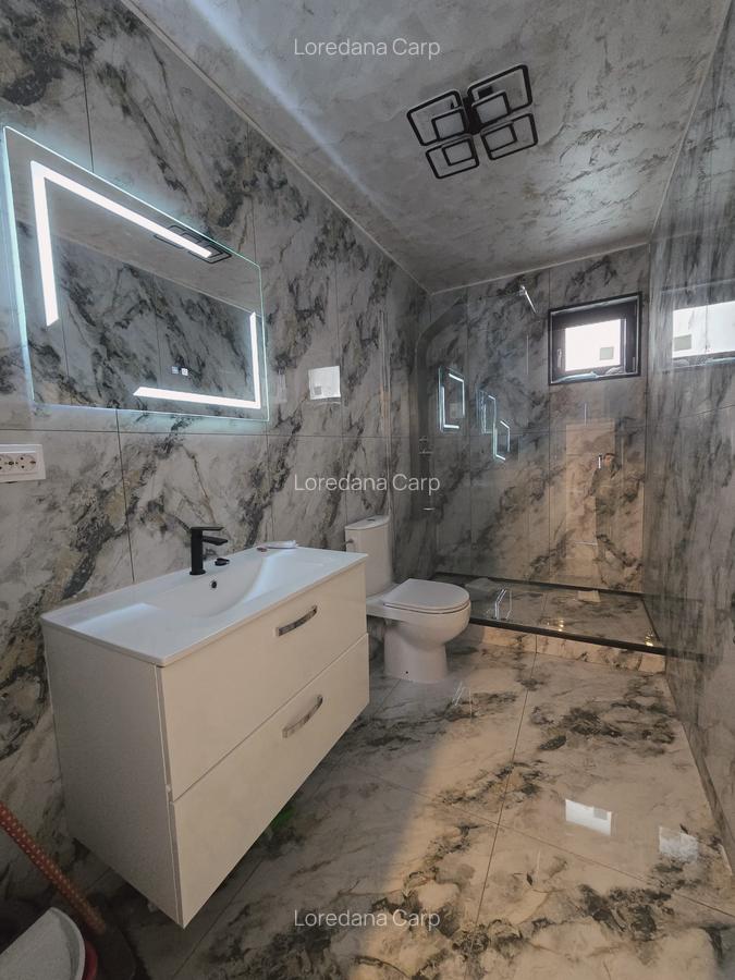 Casa individuala- 3 camere - 2 bai- incalzire pardoseala - 5