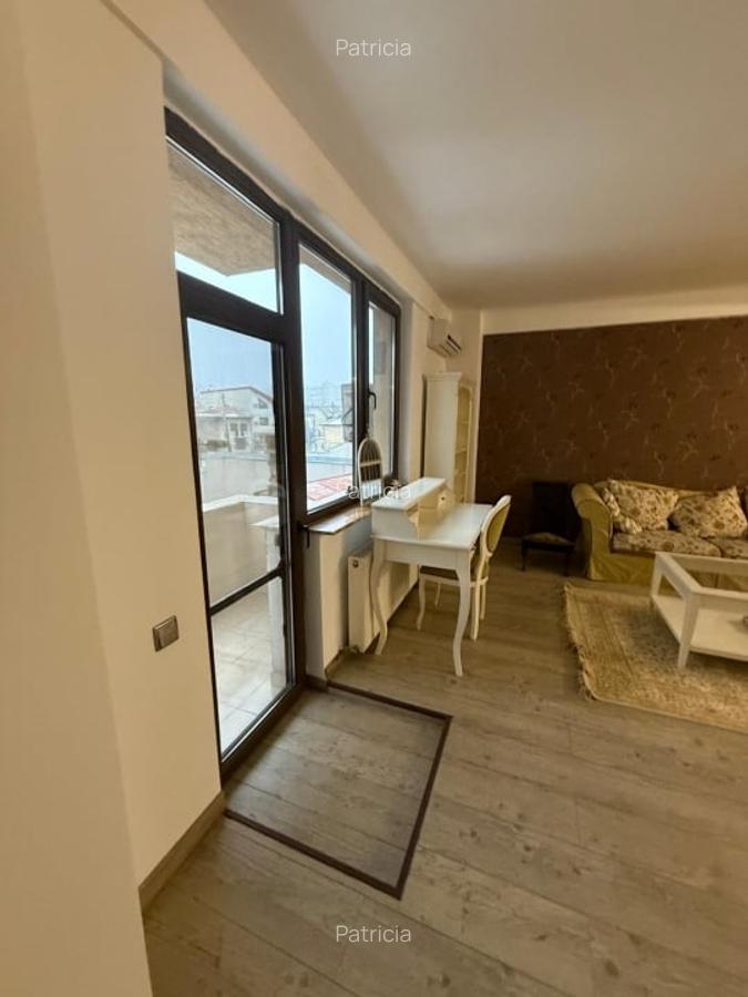 Apartament generos de 2 camere- de inchiriat- metrou 1 Mai - 2