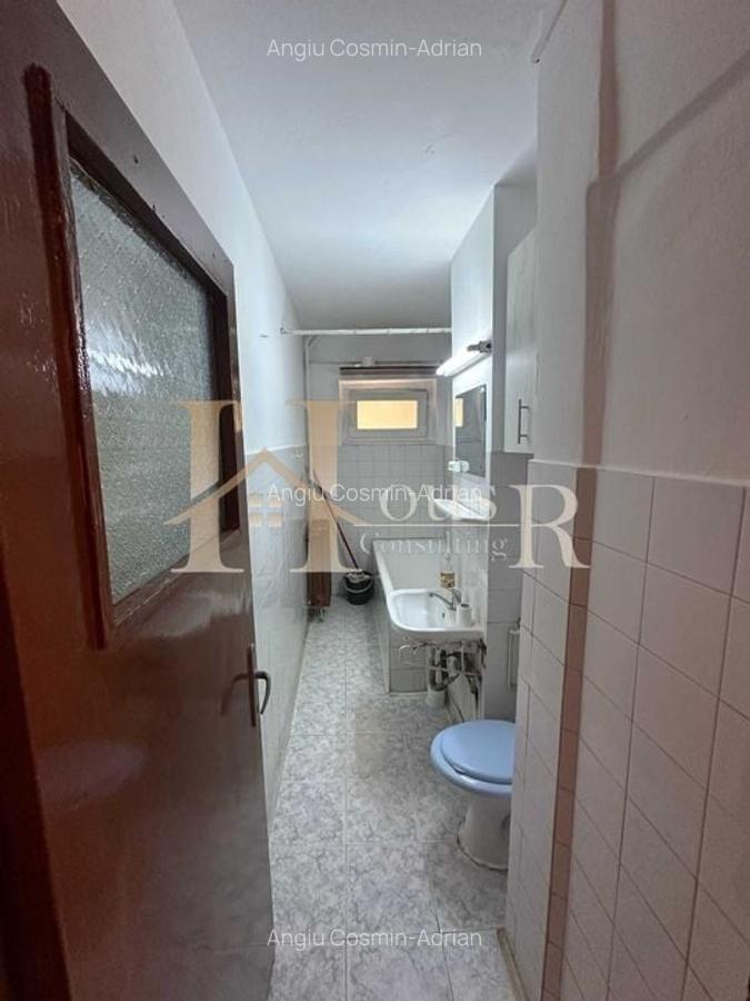 Parter inalt in bloc izolat. Decomandat. Bucatarie spatioasa. - 8