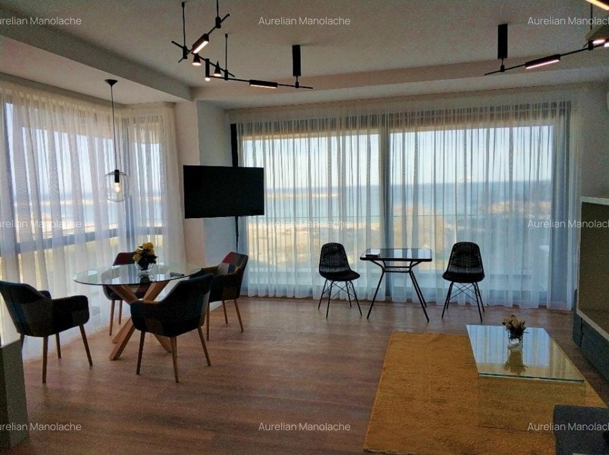 Apartament lux, frontal la mare, complet nou, cu garaj subteran - 1