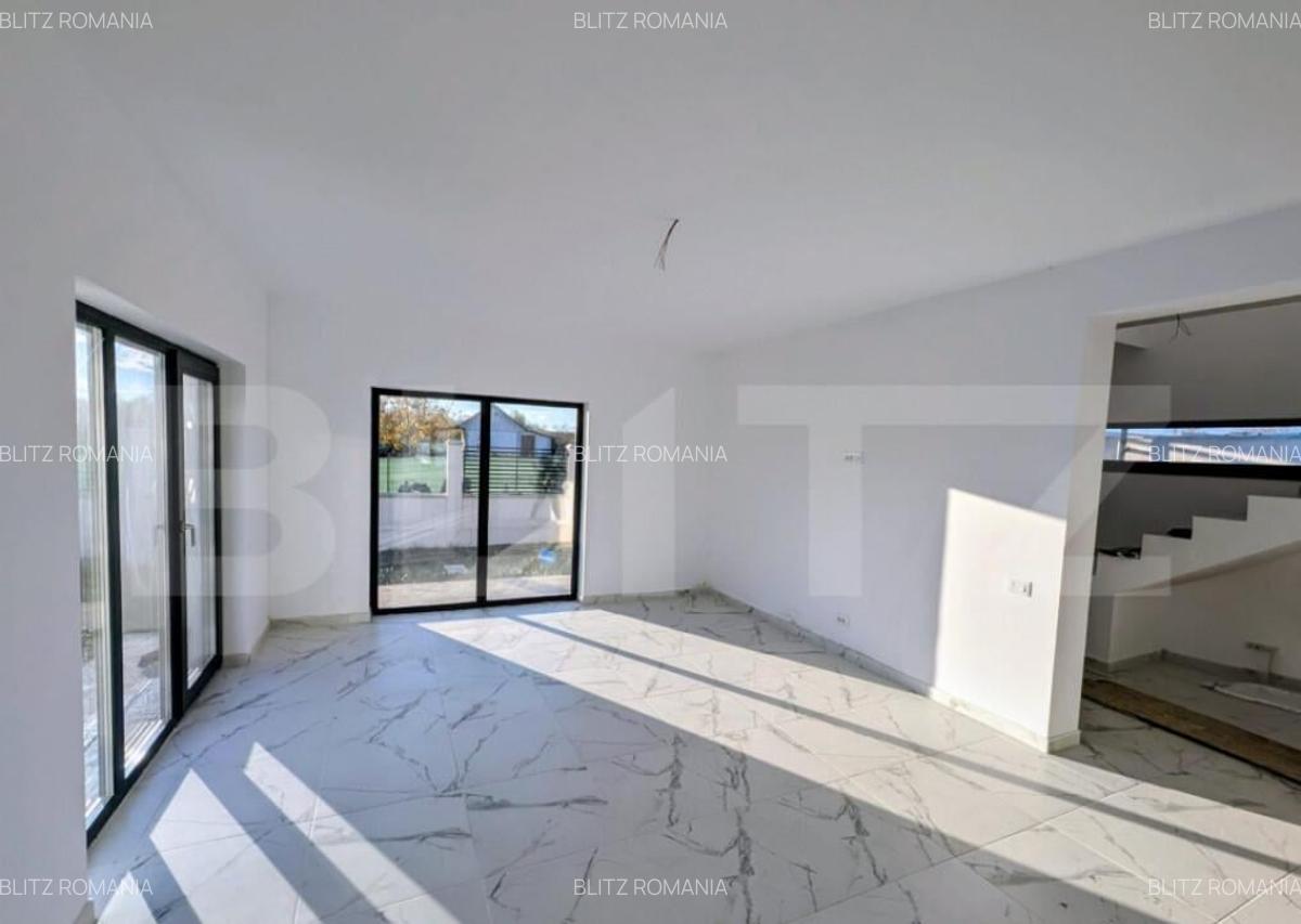 Casa moderna situata intr-o zona linistita, cu acces facil l - 15