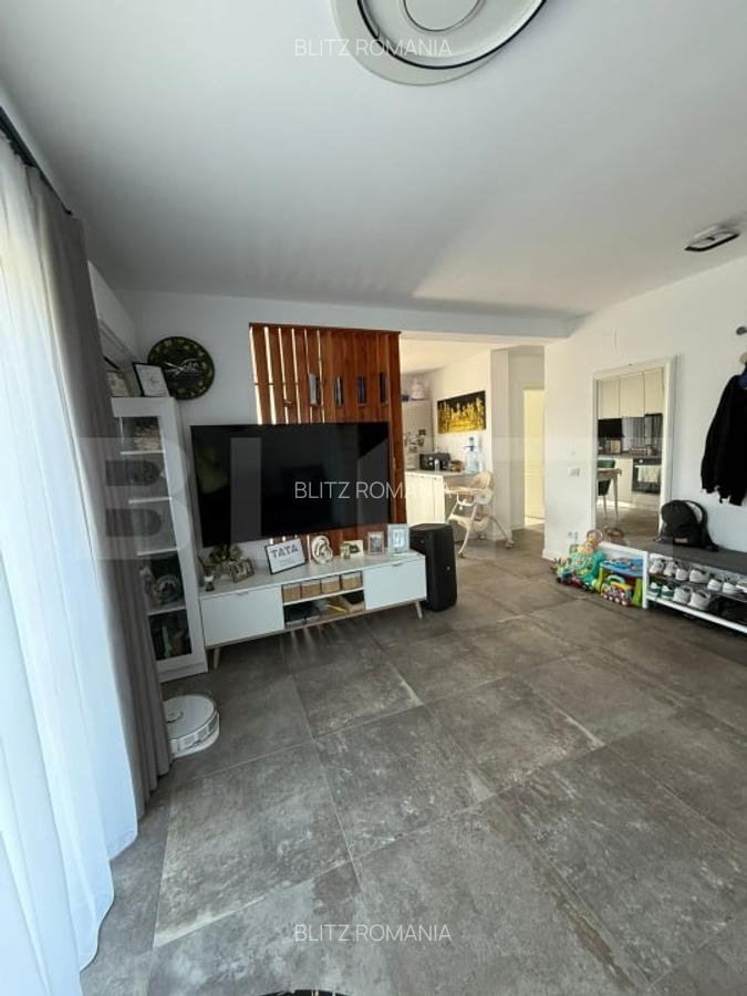Apartament cu 3 camere, 65 mp si un foisor cu gradina de 191 mp - 12