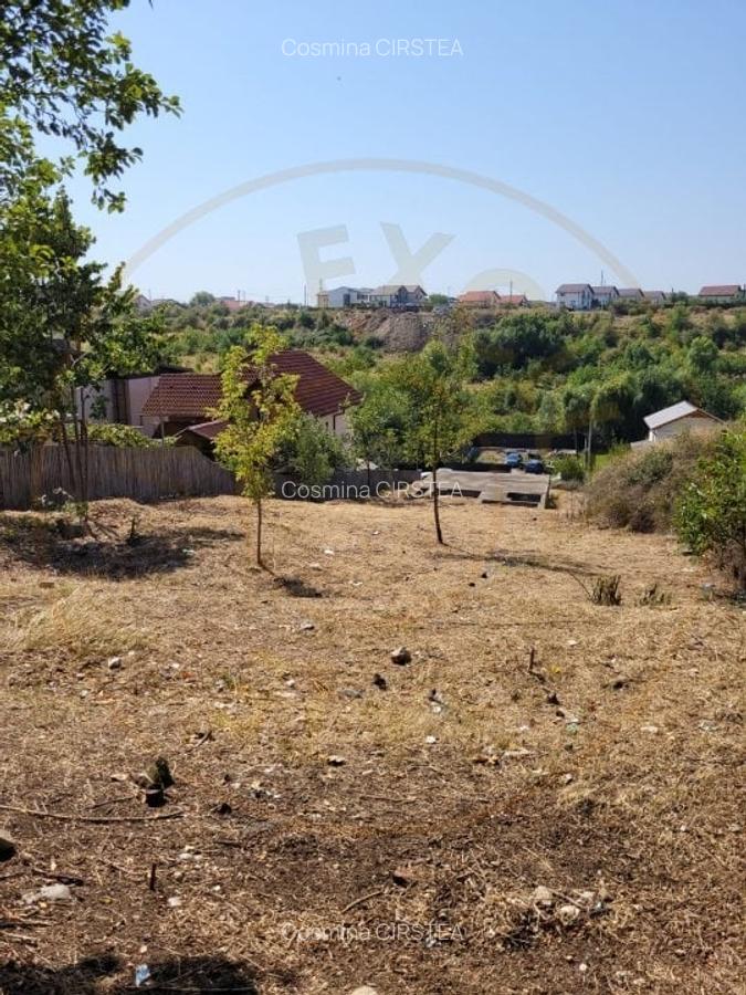 Teren intravilan Pitesti - langa liceul Odobescu - 1083 mp, demisol executat - 5