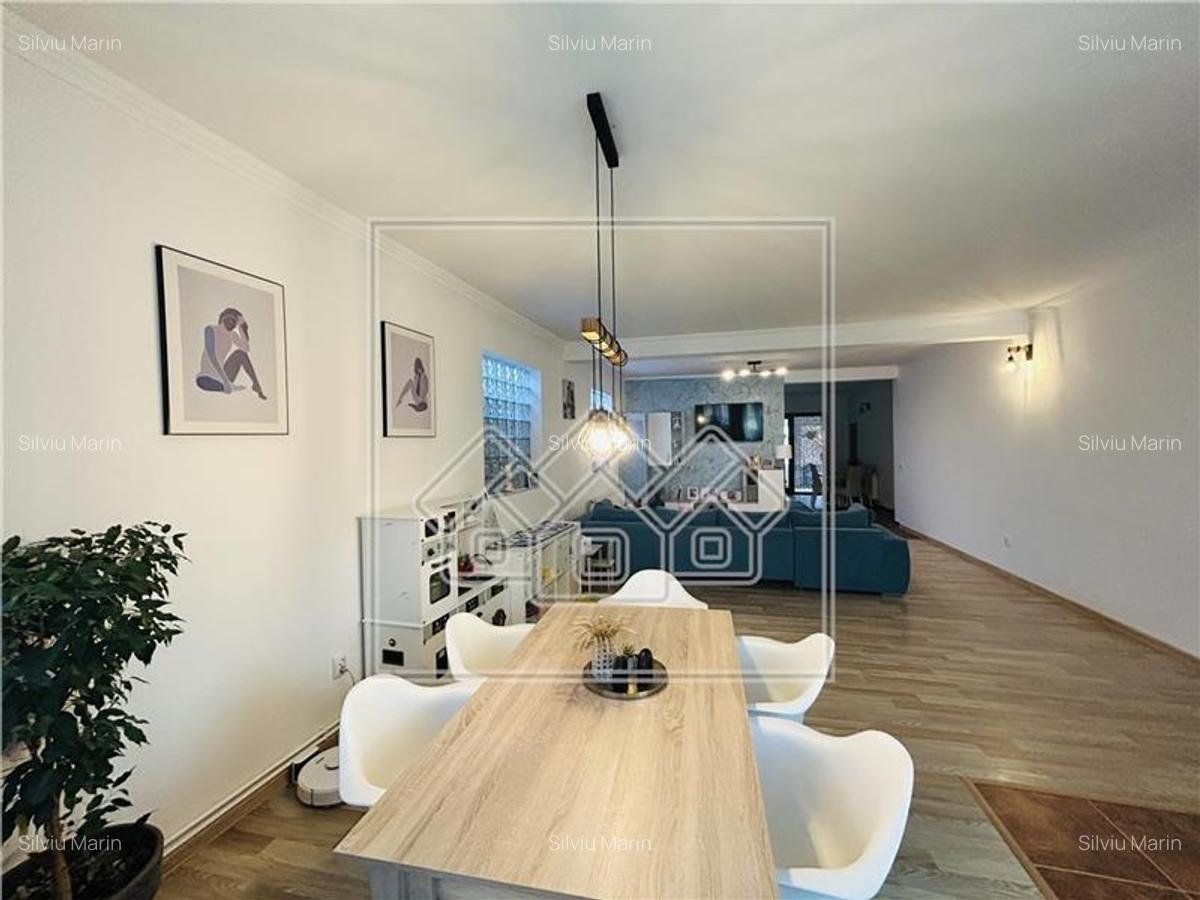 Casa pe un singur nivel - teren de 700 mp - 2 constructii in curte - 7