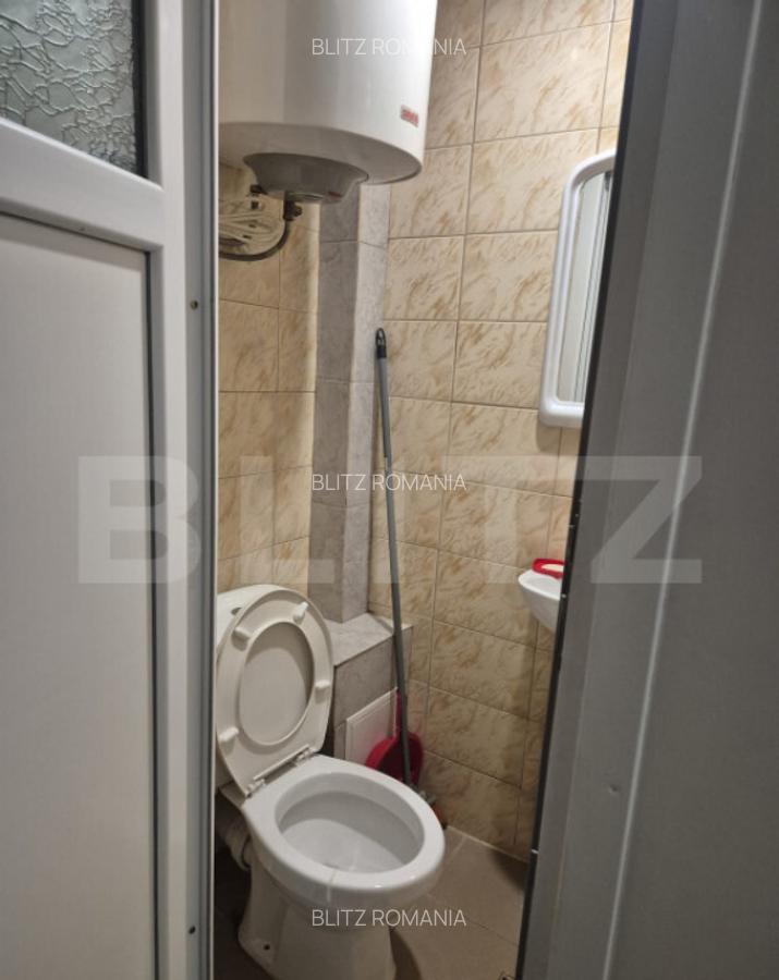 Camera de inchiriat, cu baie eleganta si mica chicineta, zon - 1