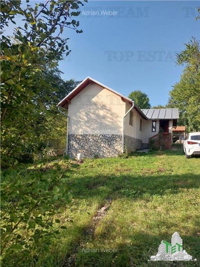 Casa individuala superba 3 camere, pivnita 24mp si teren generos 550mp in Comarn - 2