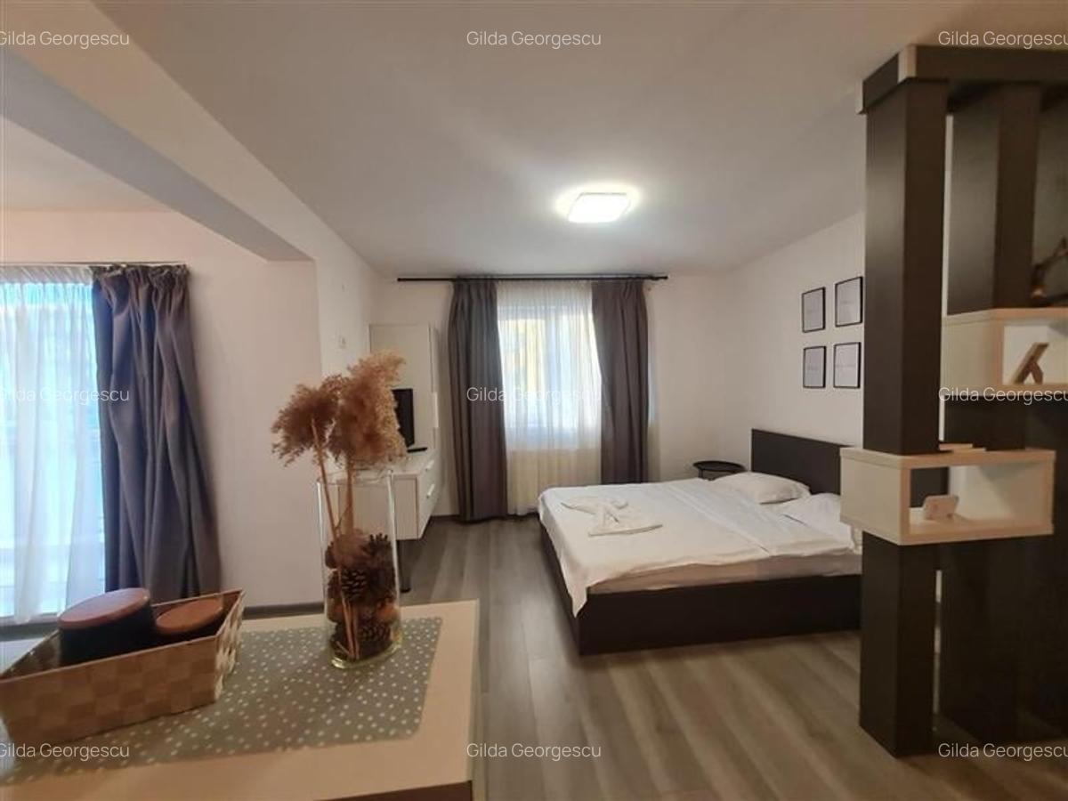 Apartament cu 2 camere decomandat, mobilat în Tractorul - 2