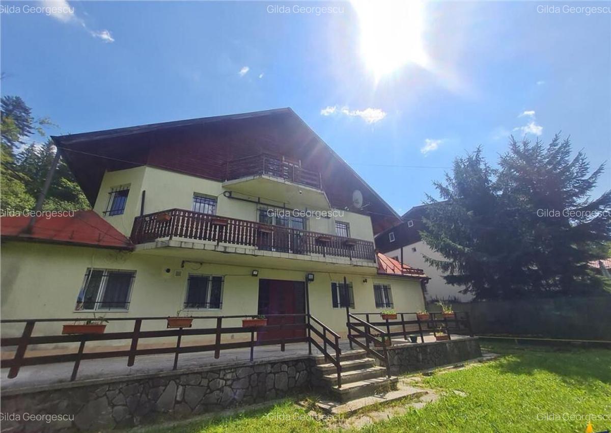 FILM! Refugiu de vacanta, cu foisor, gradina si muntii in za - 11