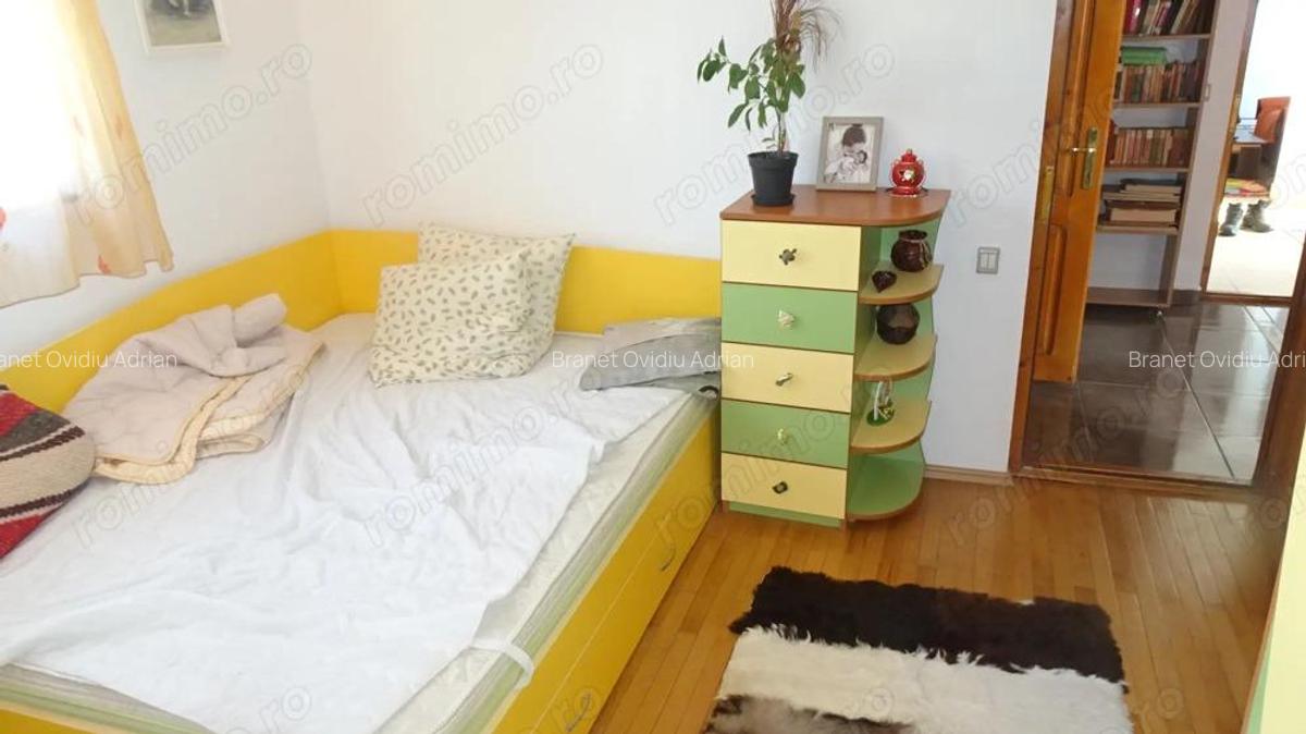 Vand casa in sistem P+M, are suprafa?a utila 160 mp,finisata integral ?i echipata complet. - 8