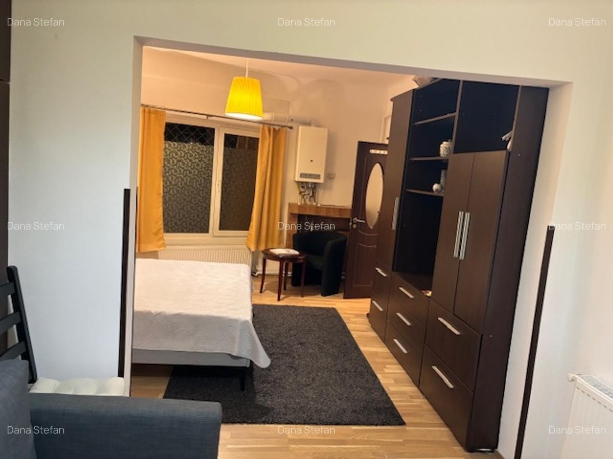 Garsonieră decomandată, mobilată în P-ța Muncii - 1