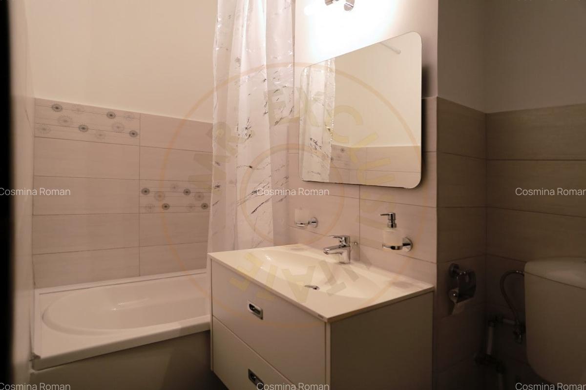 Inchiriere Apartament modern ultracentral - totul nou - 12