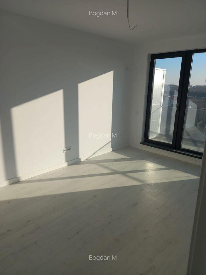 N. Grigorescu 2 camere decomandat 56 mp + terasa 15 mp - 1