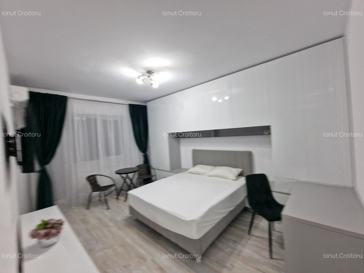 Apartament 1 camera UNIREA TOWERS - mobilat si utilat - amenajari premium - 16