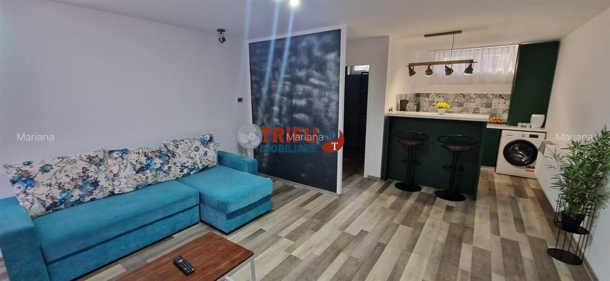 Imobil compus din 3 apartamente si 2 garsoniere - 1
