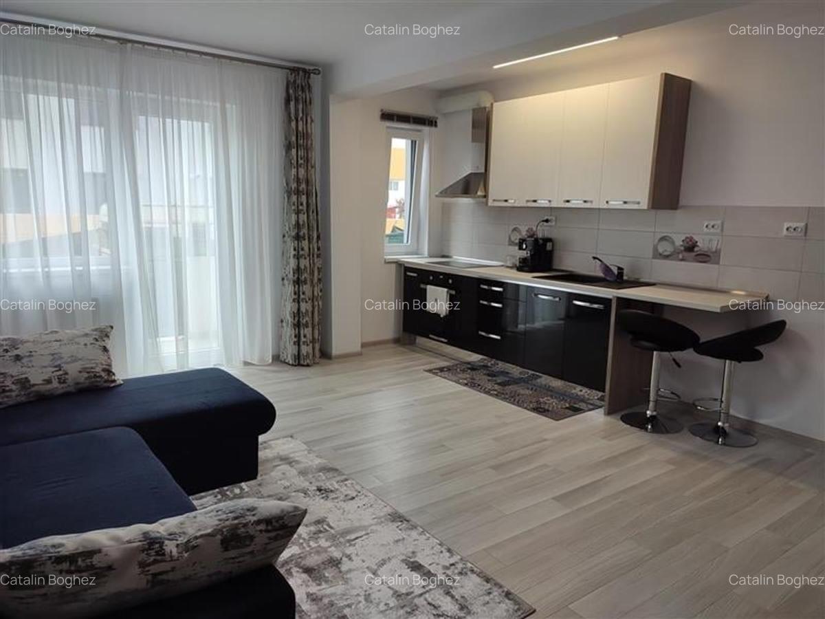 REZERVAT - GARSONIERA CU BALCON SI GRADINA PROPRIE IN TRACTORUL - 1