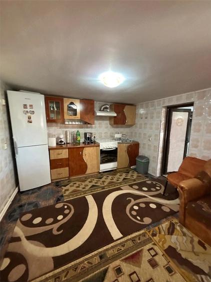Casă cu Teren 814 Mp în