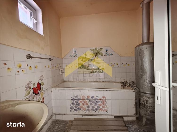 Casă cu 4 camere cu Teren 1199 Mp în Central