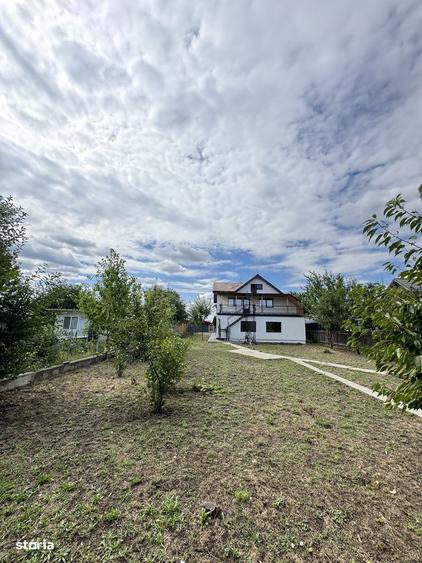 Casă cu 4 camere cu Teren 1000 Mp în Holboca