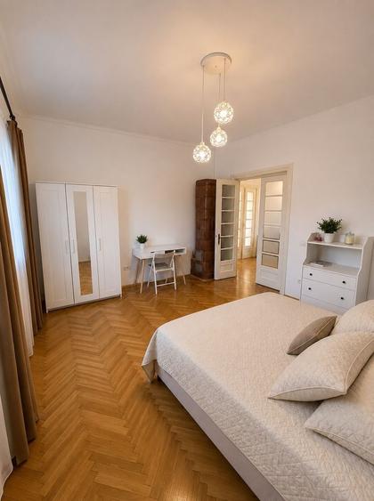 Apartament cu 3 camere semidecomandat, mobilat în Central
