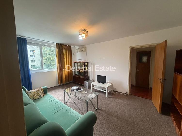 Apartament cu 3 camere semidecomandat, mobilat în Titan