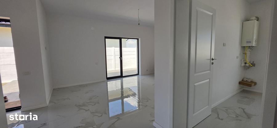 Casă cu 4 camere cu Teren 350 Mp în Clinceni