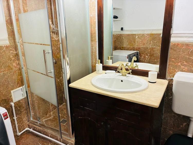 Apartament cu 2 camere nedecomandat în Calea Victoriei