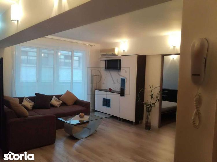 Apartament cu 2 camere, mobilat în Romană