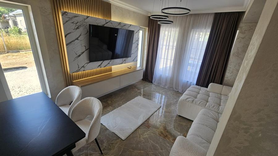 Casă cu 4 camere cu Teren 300 Mp în Central