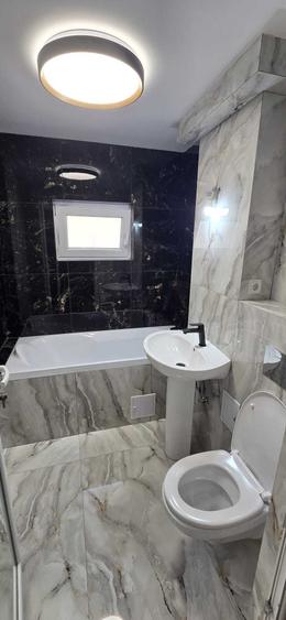 Apartament cu 4 camere semidecomandat în Central