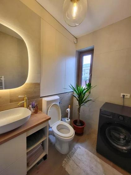 Apartament cu 3 camere semidecomandat, mobilat în Borhanci