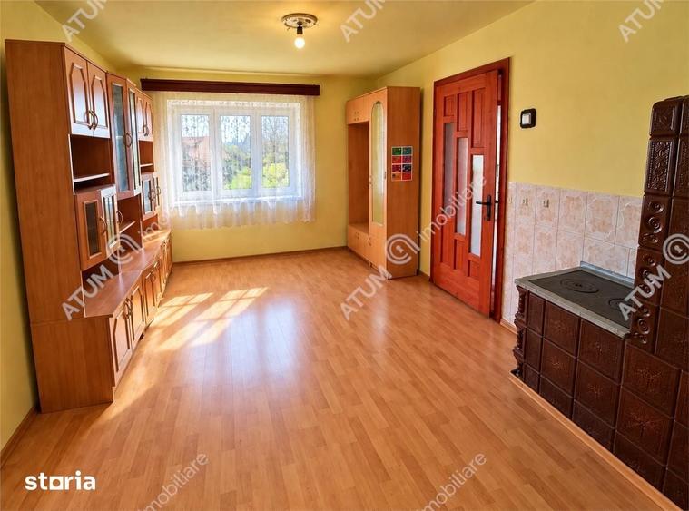Casă cu 4 camere decomandat cu Teren 1650 Mp în Porumbacu de Jos