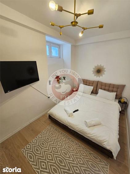 Apartament cu 4 camere decomandat în Romană