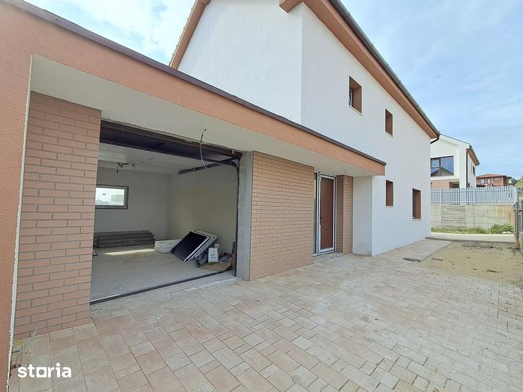 Casa cuplata prin garaj 23 mp, sup.totala 147 mp,teren 400 mp Chinteni - 13