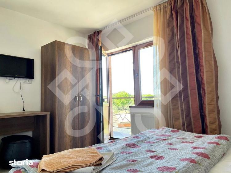 Casă cu 7 camere cu Teren 870 Mp în Sânmartin