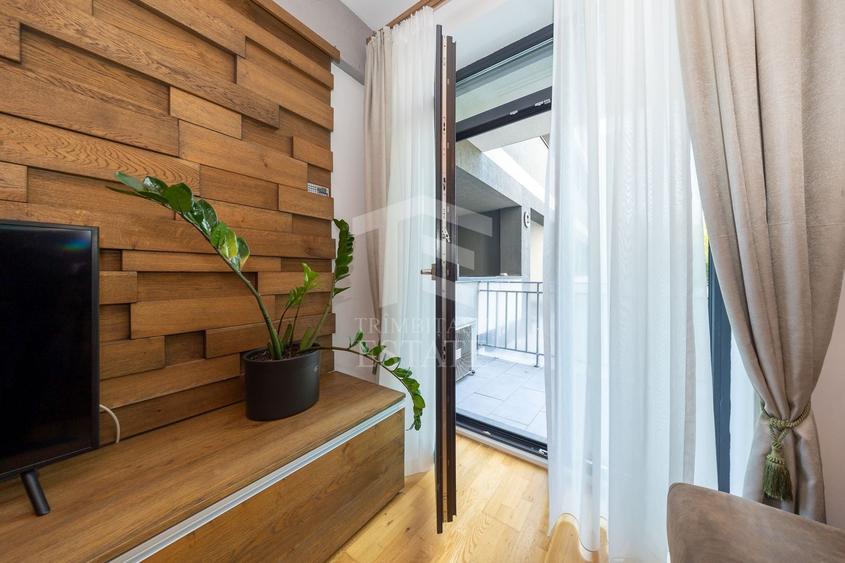 Apartament cu 2 camere semidecomandat, mobilat în Tractorul
