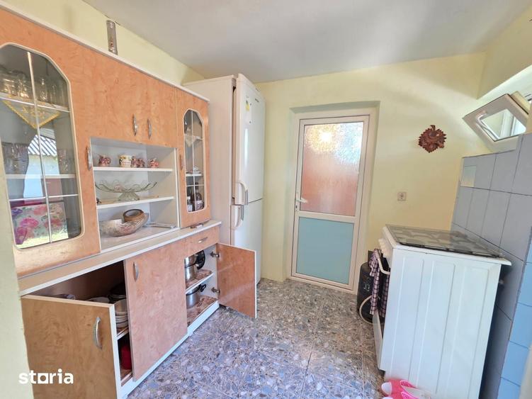 Casă cu 2 camere cu Teren 1200 Mp în Central