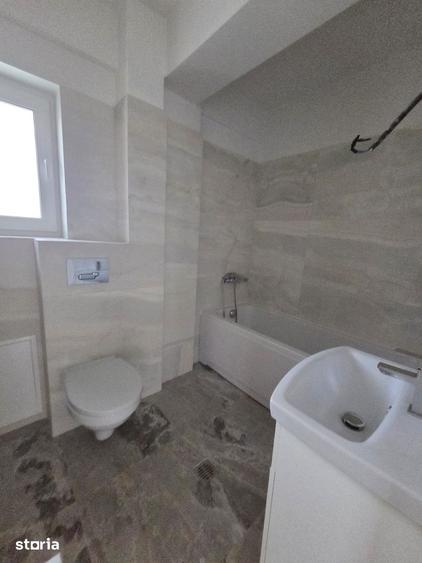 Apartament cu 2 camere decomandat în Podu Roș