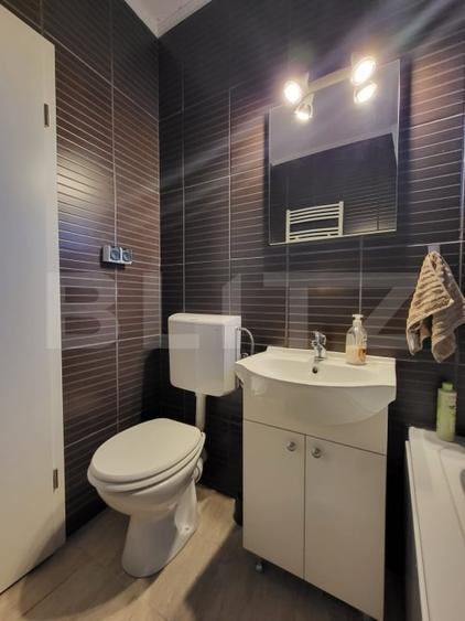 Apartament cu 2 camere semidecomandat, mobilat în Central