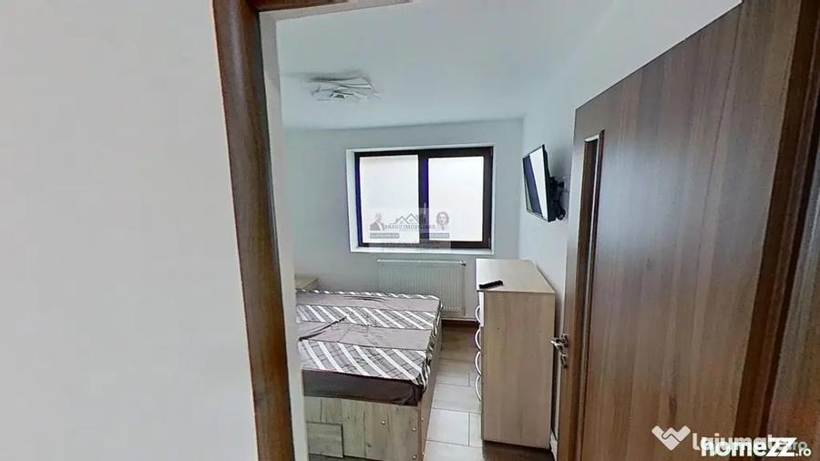 Apartament cu 3 camere semidecomandat, mobilat în Central