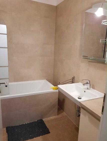 Apartament cu 2 camere semidecomandat, mobilat în Tractorul