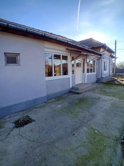 Casă cu 4 camere în Mârzănești