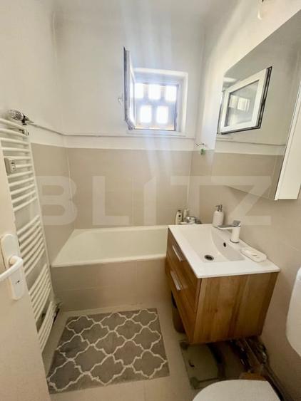 Apartament cu 2 camere semidecomandat, mobilat în Central