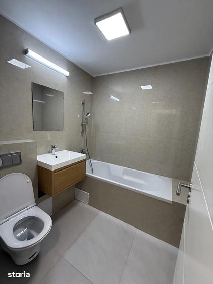 Apartament cu 2 camere semidecomandat, mobilat în Tei