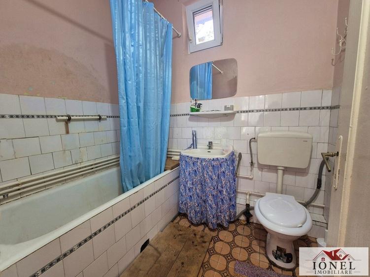 Casă individuală cu 3 camere cu Canalizare în Unirea